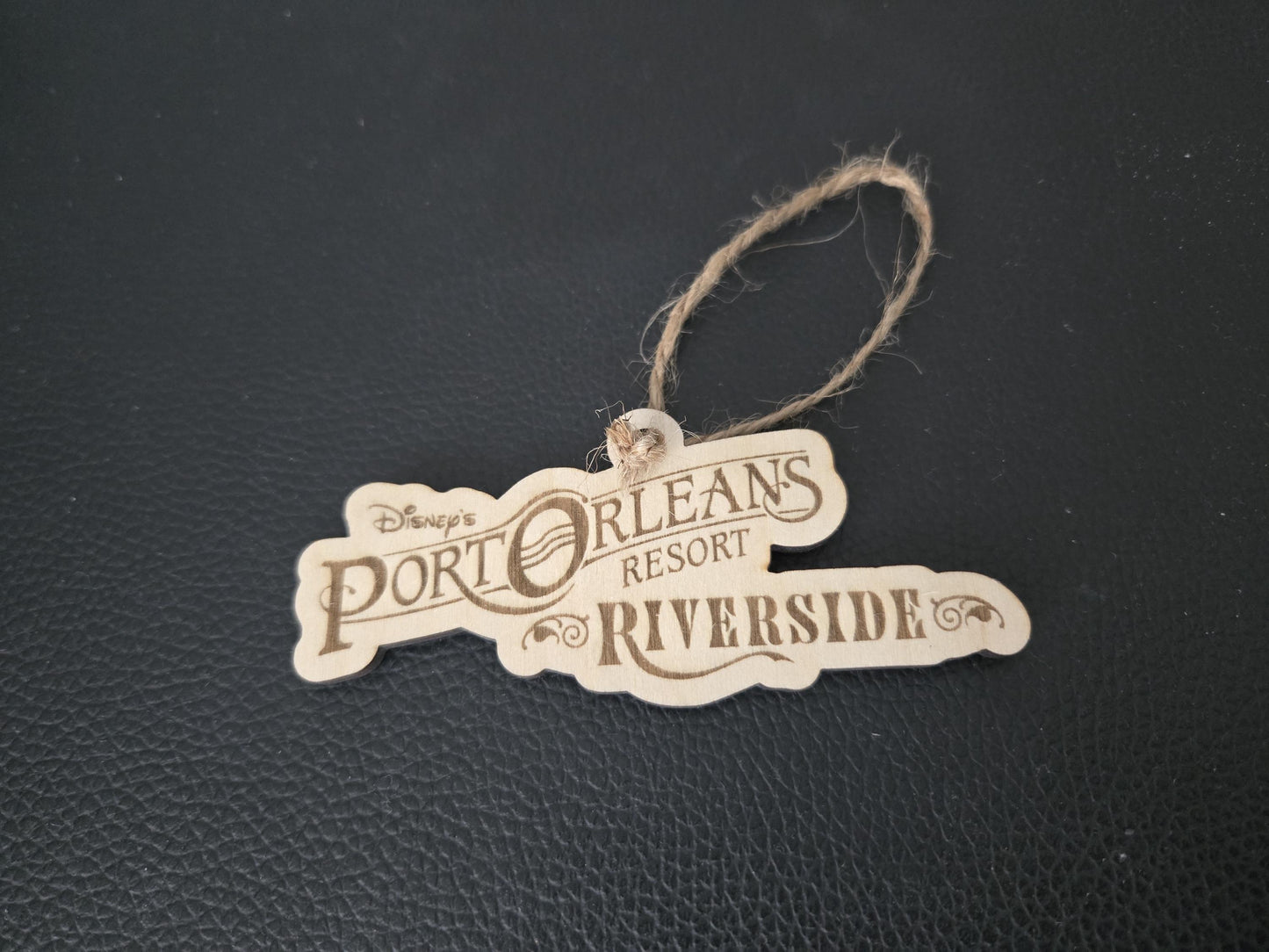 Port Orleans Riverside Resort ornament with a black background